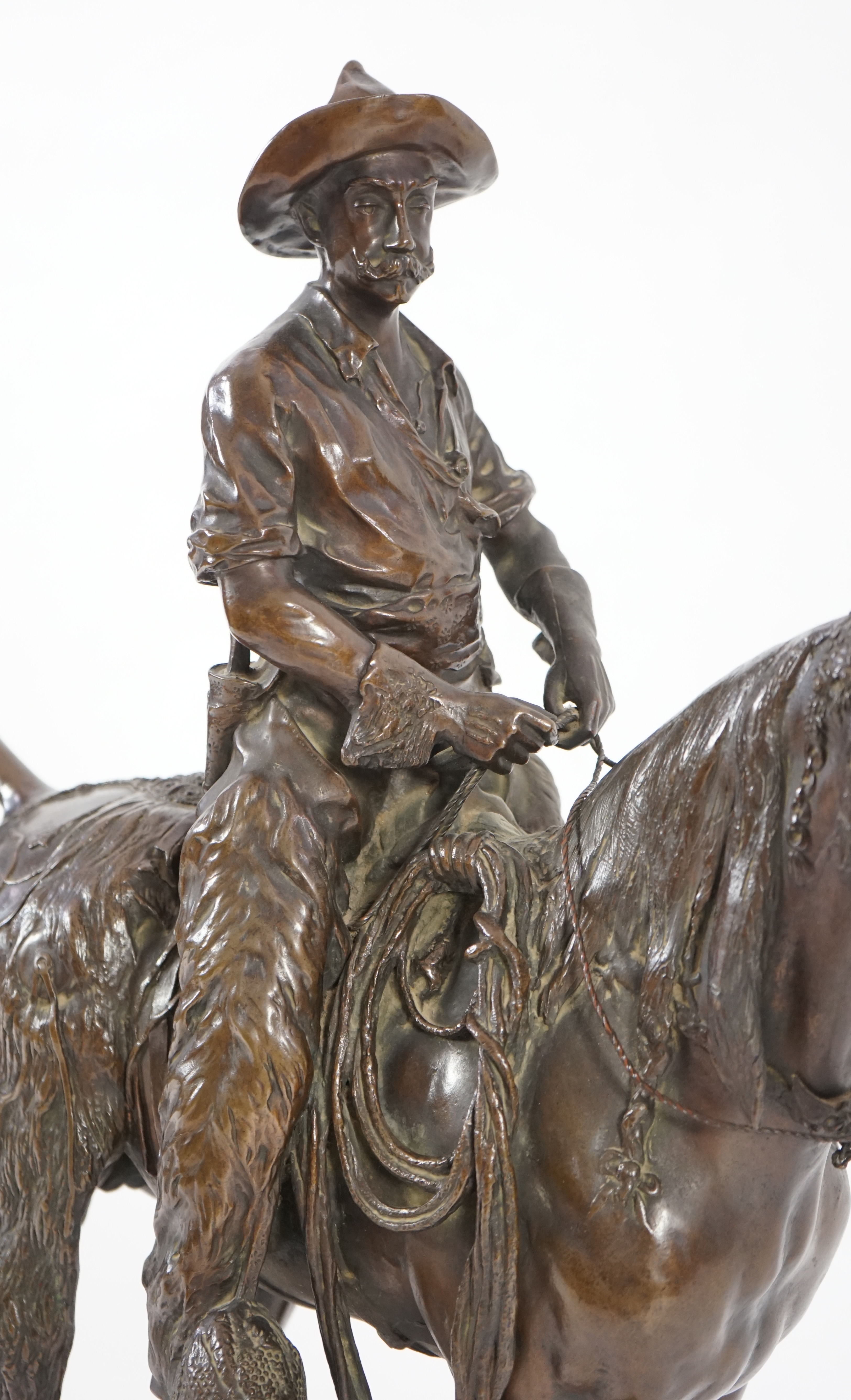 Walter Winans (St. Petersburg, 1852-Parsloe Park, Essex, 1920), a cast bronze of the artist, as a cowboy, riding the Arab stallion Skowronek, 50cm wide, 66cm high, overall 79.5cm high